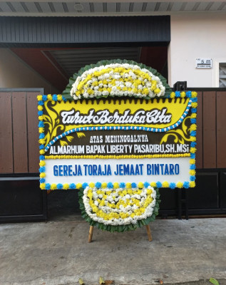 Papan Bunga Duka di Simpang Iv Sipin